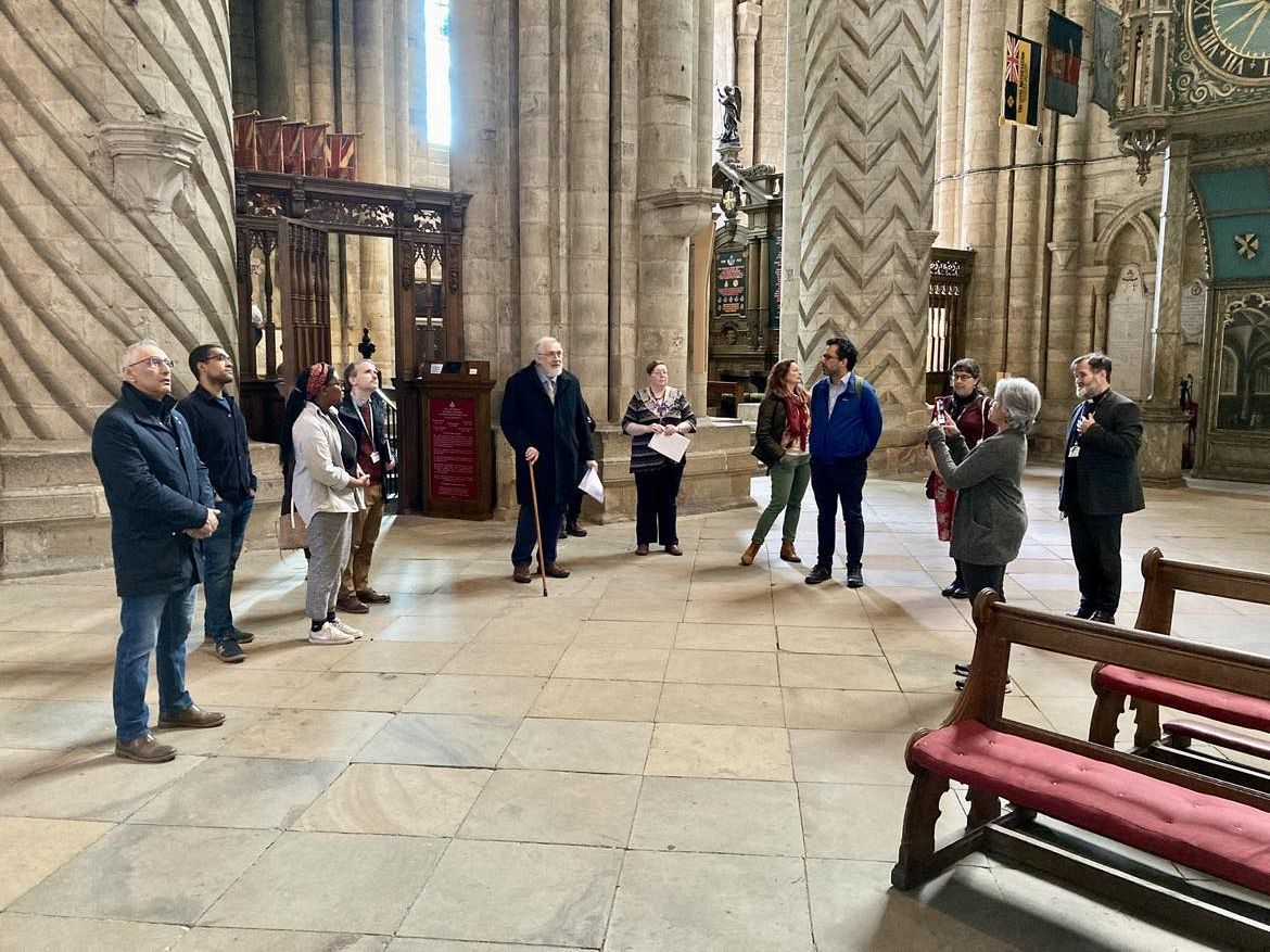 Nayanika Mookherjee carrying out the walking tour of the enslaved in Durham Cathedral as part of the IAS project (Absence presence of Durham’s Black history) with community historians, archivists, colleagues and Phd students,  from the University including PVC EDI Dr Shaid Mahmood.
